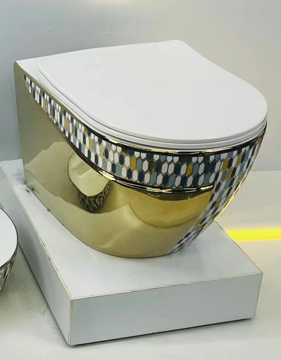 Marbo golden wall hung toilet mounted on a bathroom wall.