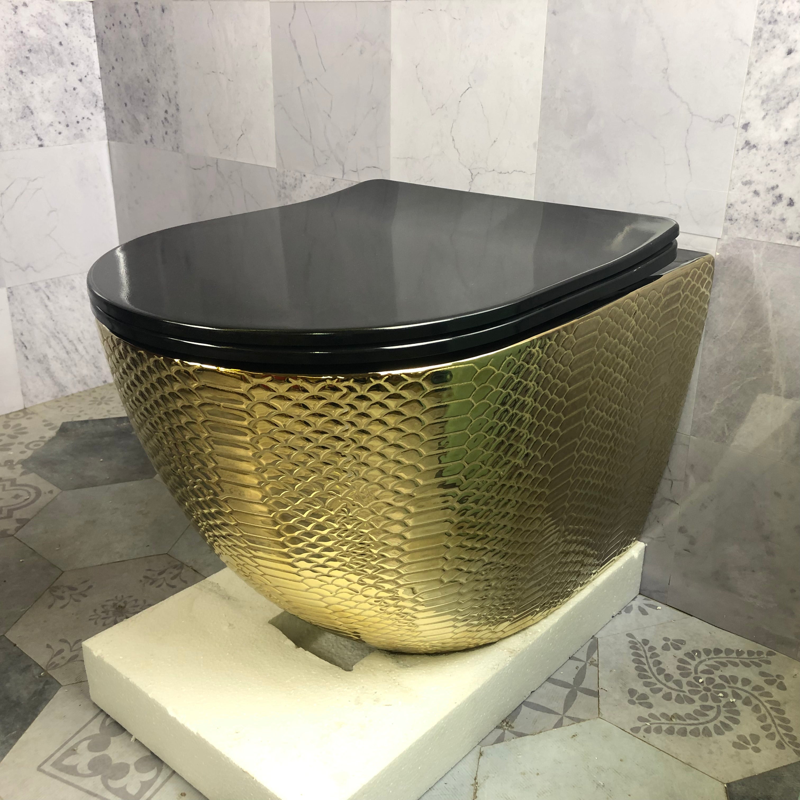 Gold textured toilet bowl with black lid in a bathroom setting
